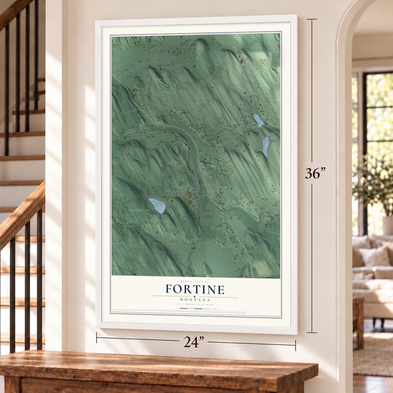 Fortine, Montana map, 24 x 36 inch print in a white frame by a staircase