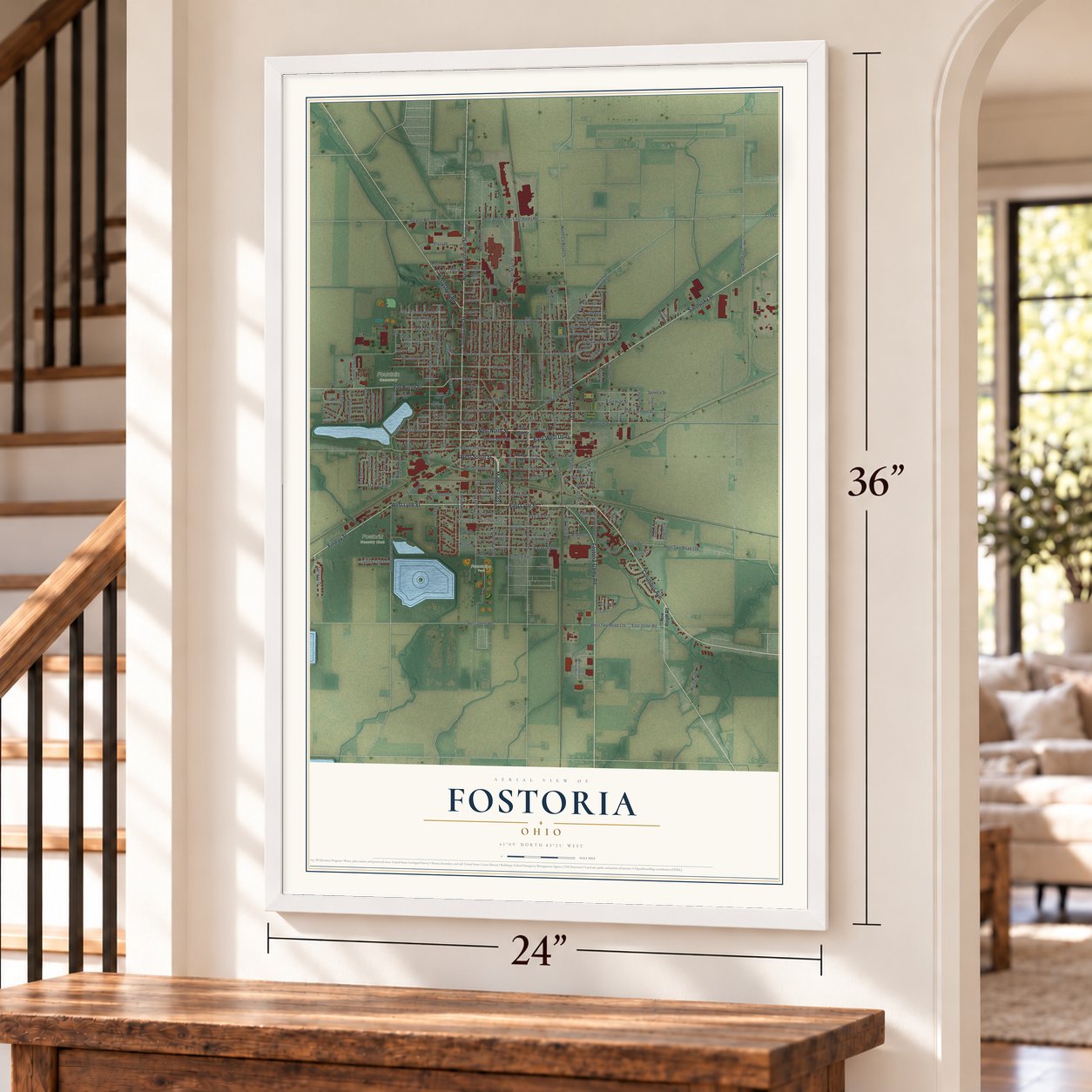 Fostoria, Ohio map, 24 x 36 inch print in a white frame by a staircase