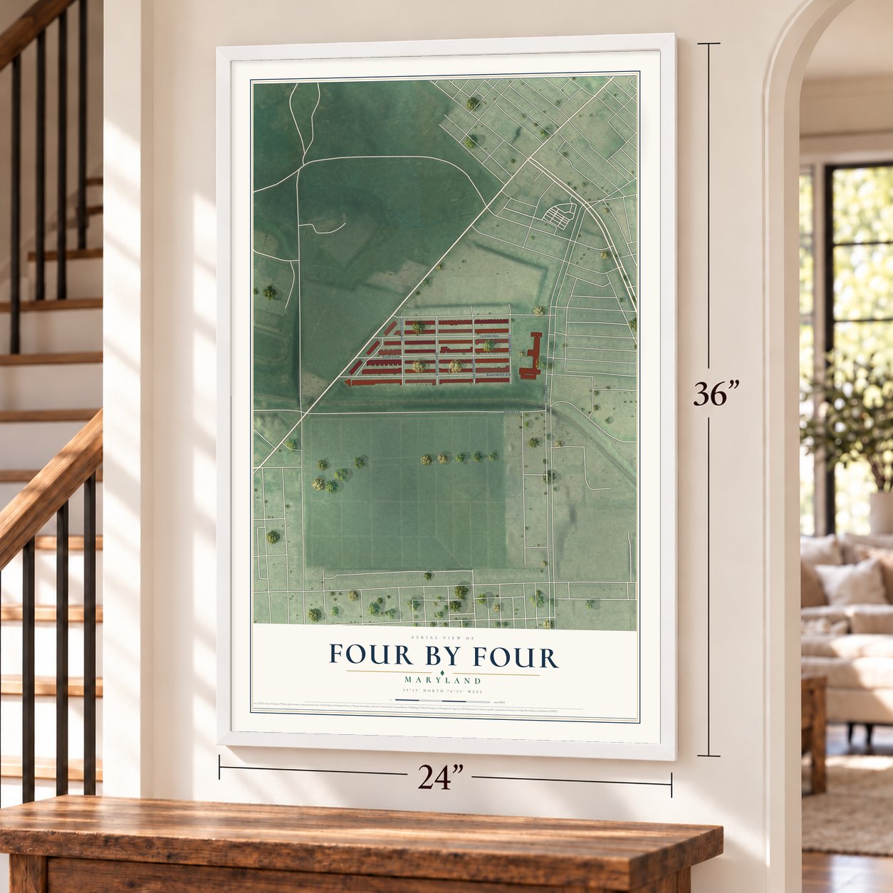 Four By Four, Maryland map, 24 x 36 inch print in a white frame by a staircase