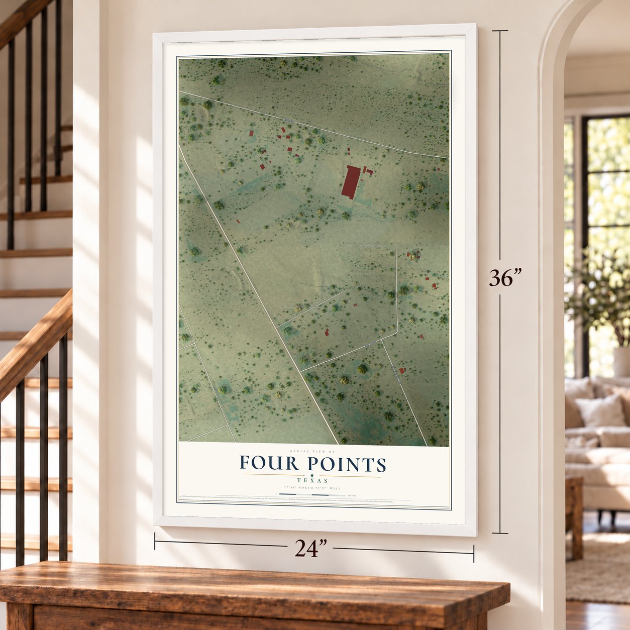 Four Points, Texas map, 24 x 36 inch print in a white frame by a staircase