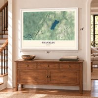 Franklin, Vermont map, 24 x 36 inch print in a white frame above a dresser by a staircase