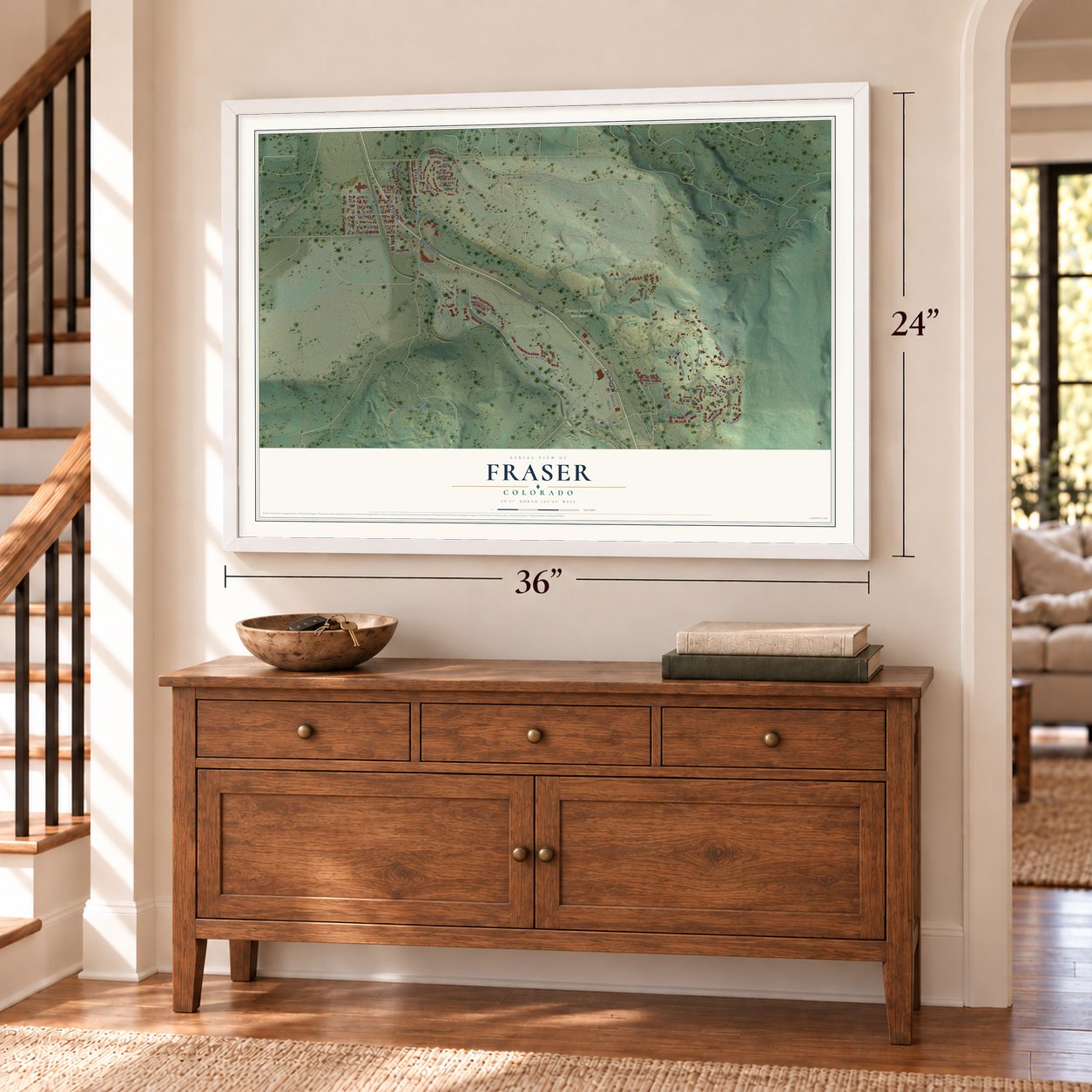 Fraser, Colorado map, 24 x 36 inch print in a white frame above a dresser by a staircase
