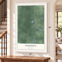 Fredonia, Michigan map, 24 x 36 inch print in a white frame by a staircase