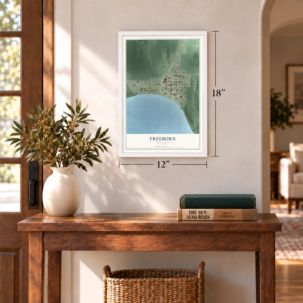 Freeborn, Minnesota map, 12 x 18 inch print in a white frame in an entryway