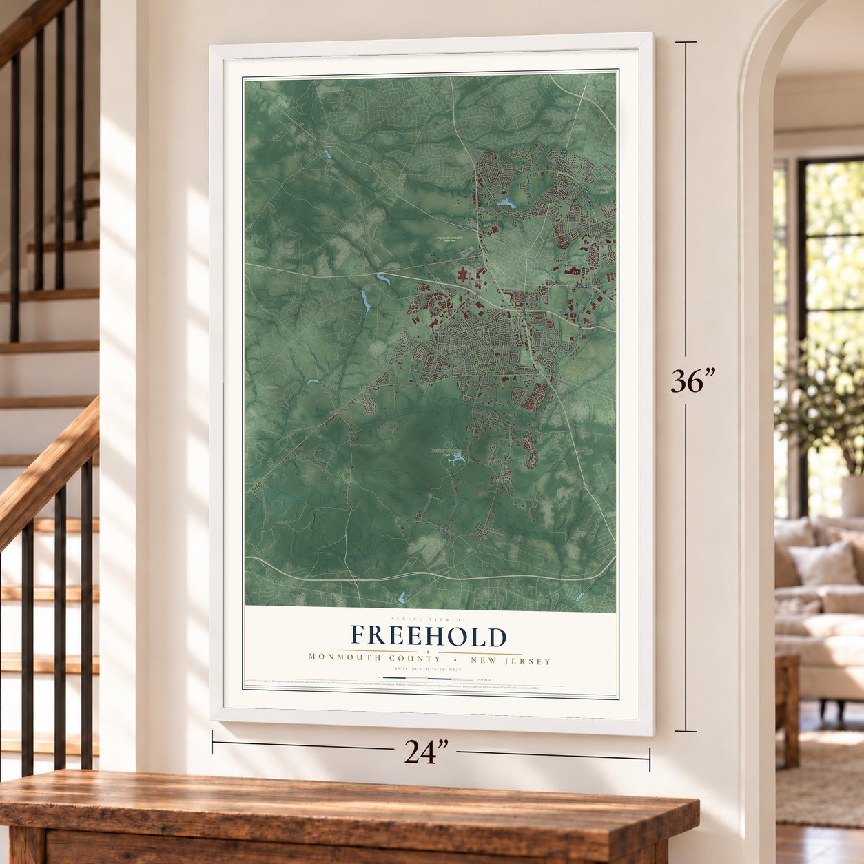 Freehold, Monmouth County, New Jersey map, 24 x 36 inch print in a white frame by a staircase