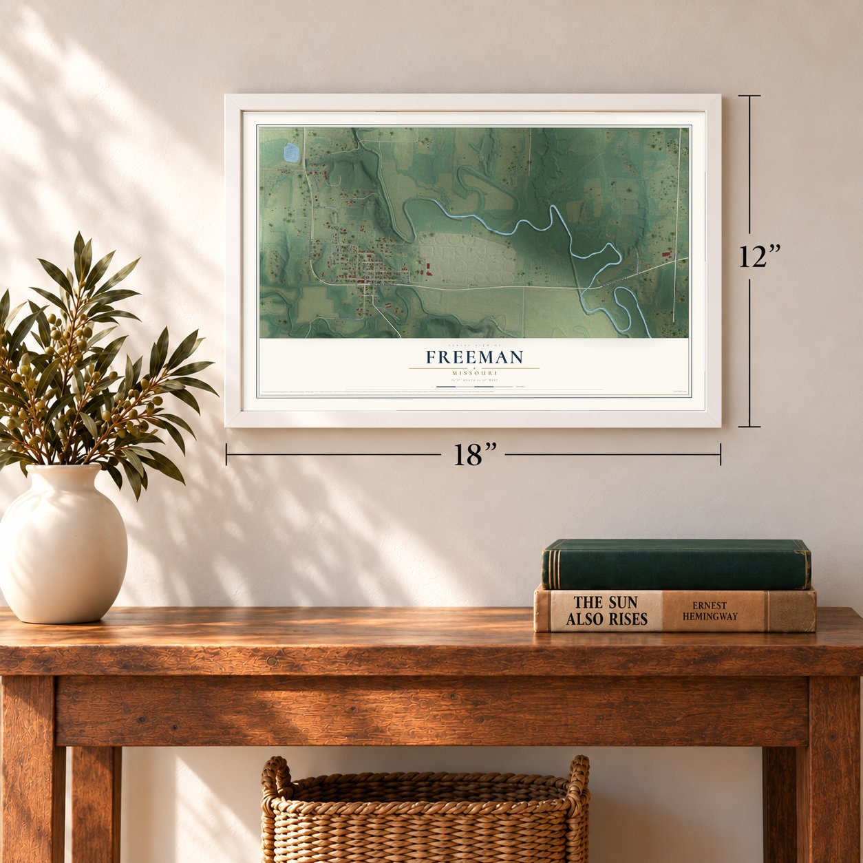Freeman, Missouri map, 12 x 18 inch print in a white frame in an entryway