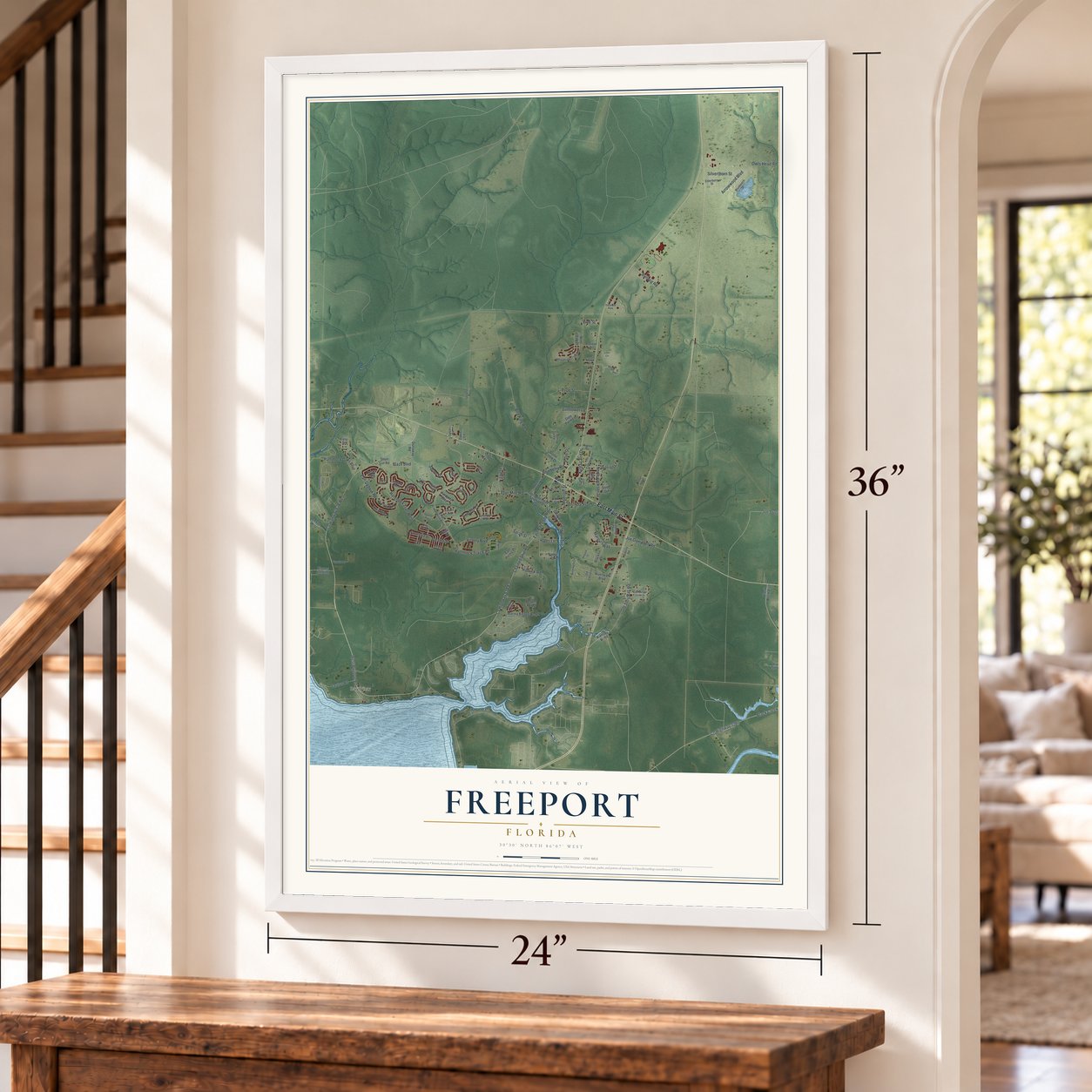 Freeport, Florida map, 24 x 36 inch print in a white frame by a staircase