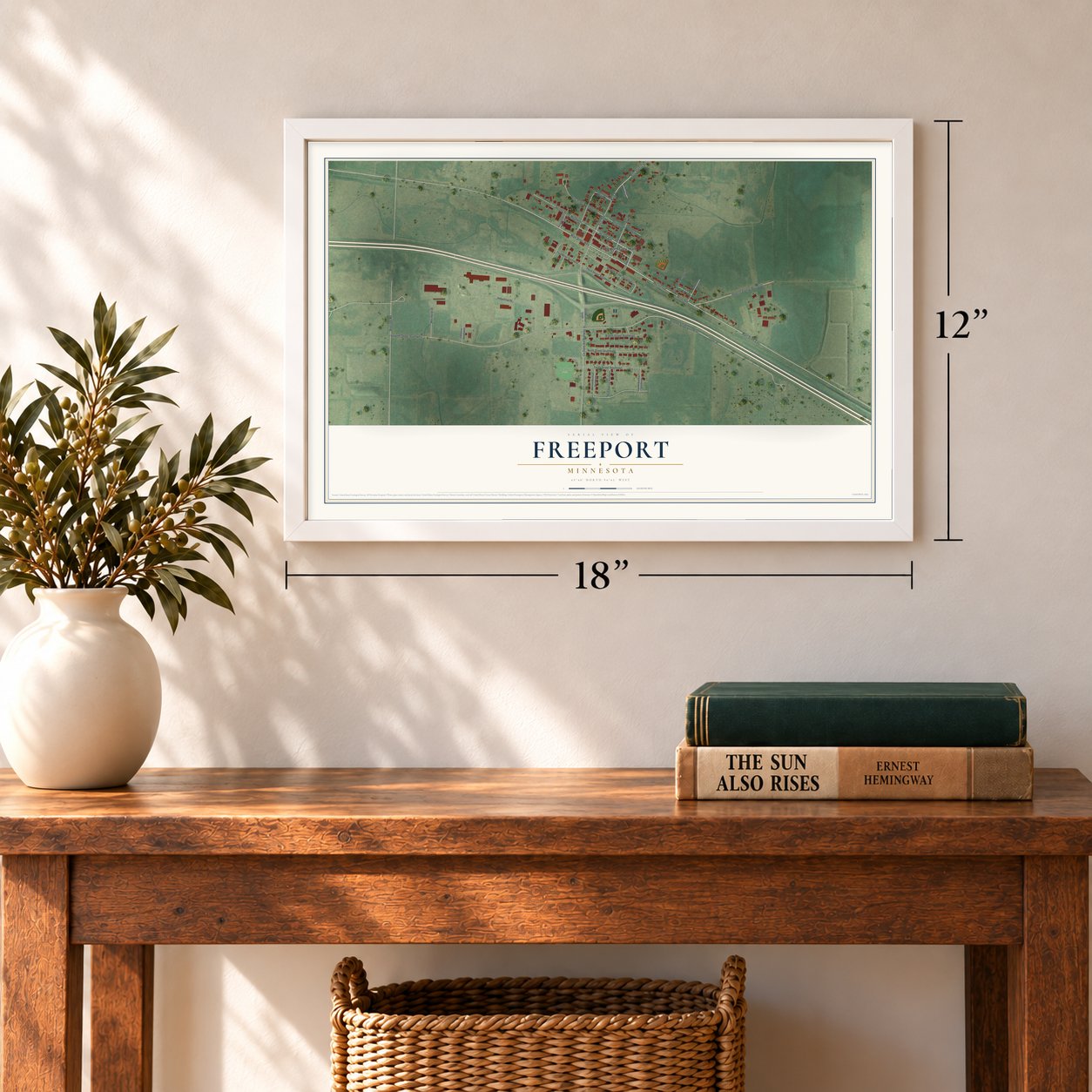 Freeport, Minnesota map, 12 x 18 inch print in a white frame in an entryway