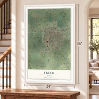 Freer, Texas map, 24 x 36 inch print in a white frame by a staircase