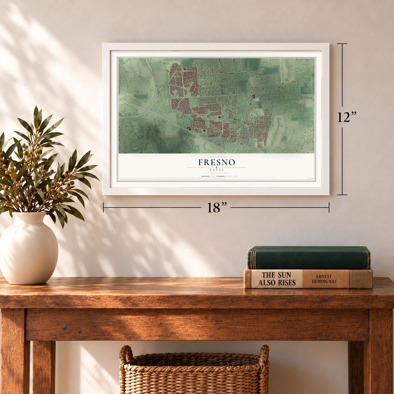Fresno, Texas map, 12 x 18 inch print in a white frame in an entryway