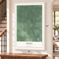 Frost, Michigan map, 24 x 36 inch print in a white frame by a staircase