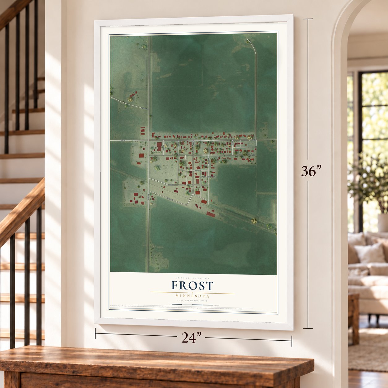 Frost, Minnesota map, 24 x 36 inch print in a white frame by a staircase
