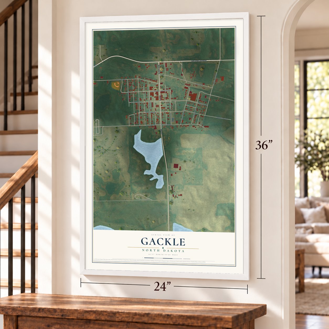 Gackle, North Dakota map, 24 x 36 inch print in a white frame by a staircase