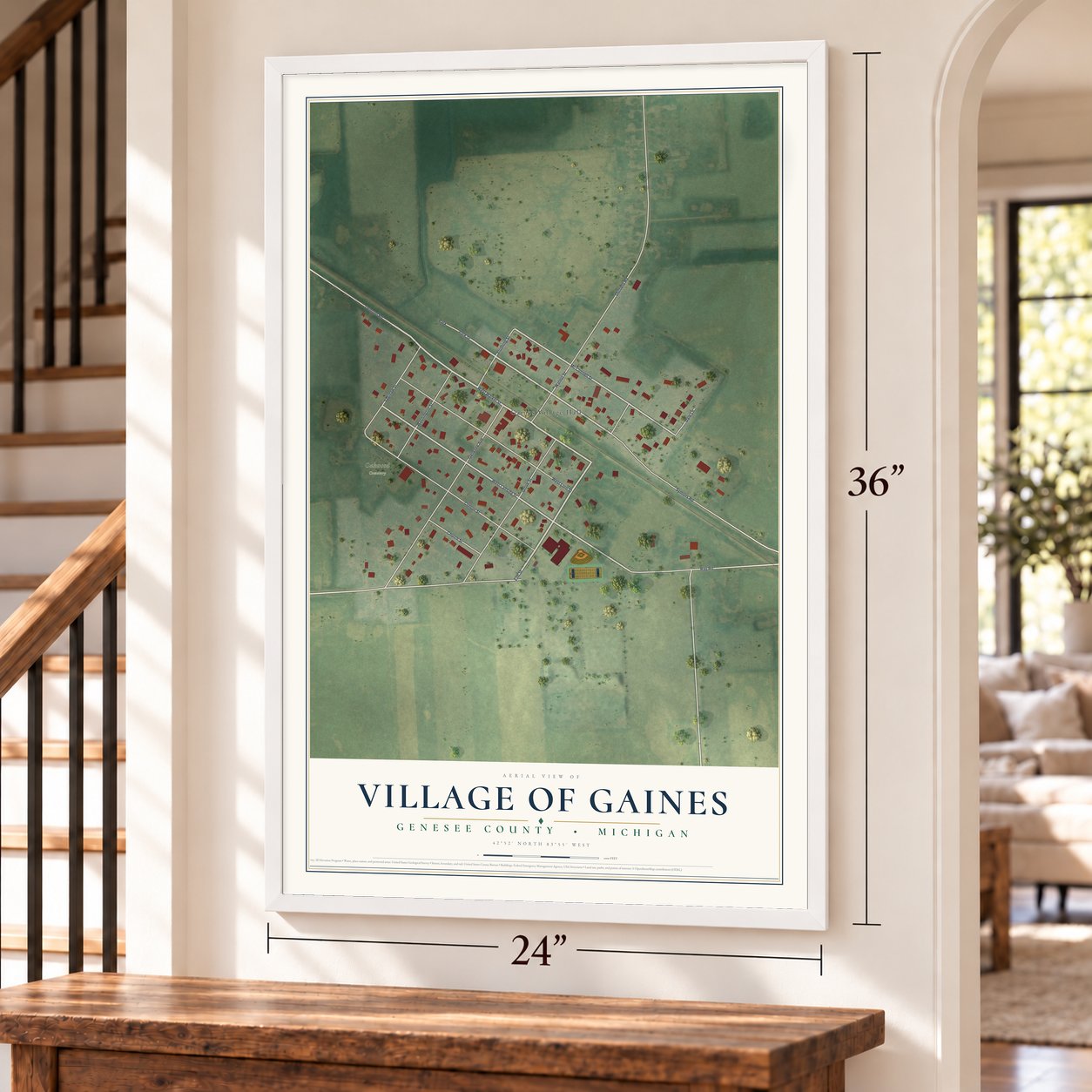Gaines, Michigan map, 24 x 36 inch print in a white frame by a staircase