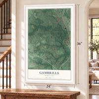 Gambrills, Maryland map, 24 x 36 inch print in a white frame by a staircase