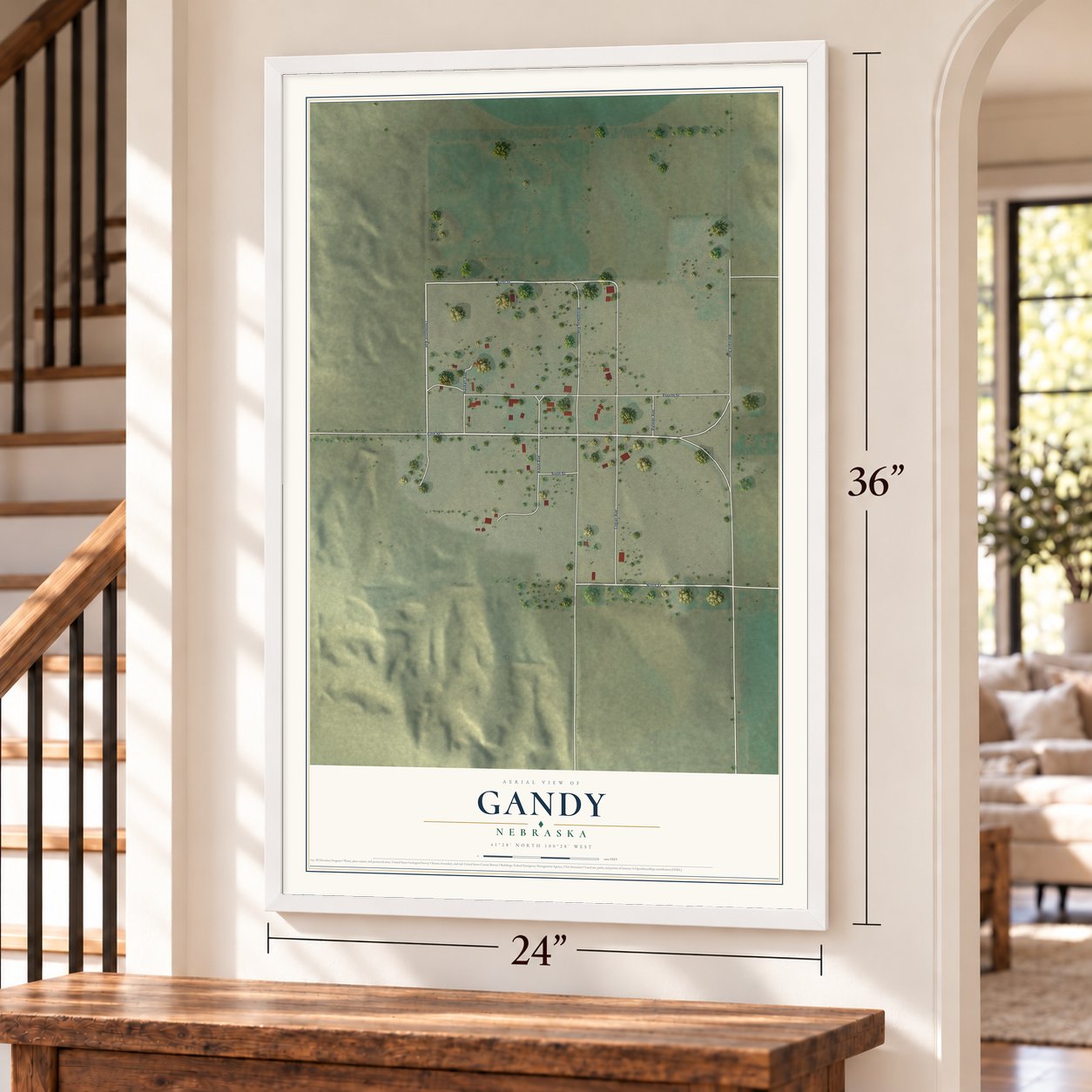 Gandy, Nebraska map, 24 x 36 inch print in a white frame by a staircase