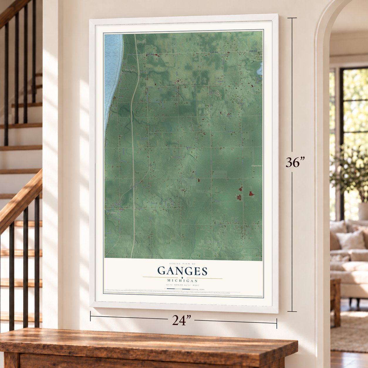 Ganges, Michigan map, 24 x 36 inch print in a white frame by a staircase