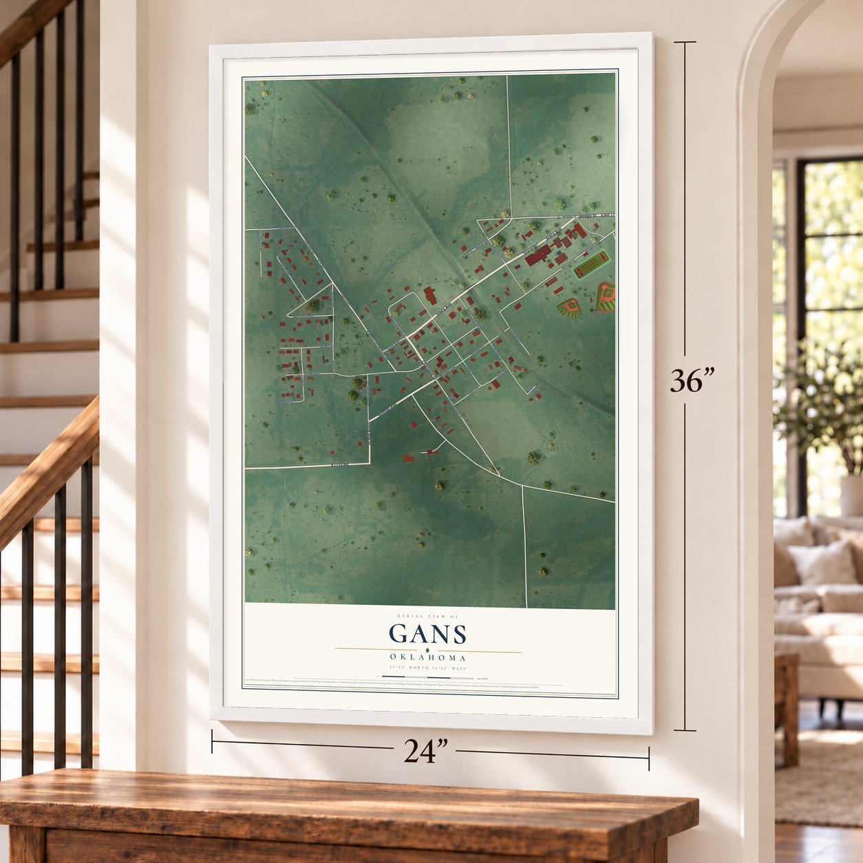 Gans, Oklahoma map, 24 x 36 inch print in a white frame by a staircase