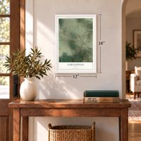 Garciasville, Texas map, 12 x 18 inch print in a white frame in an entryway