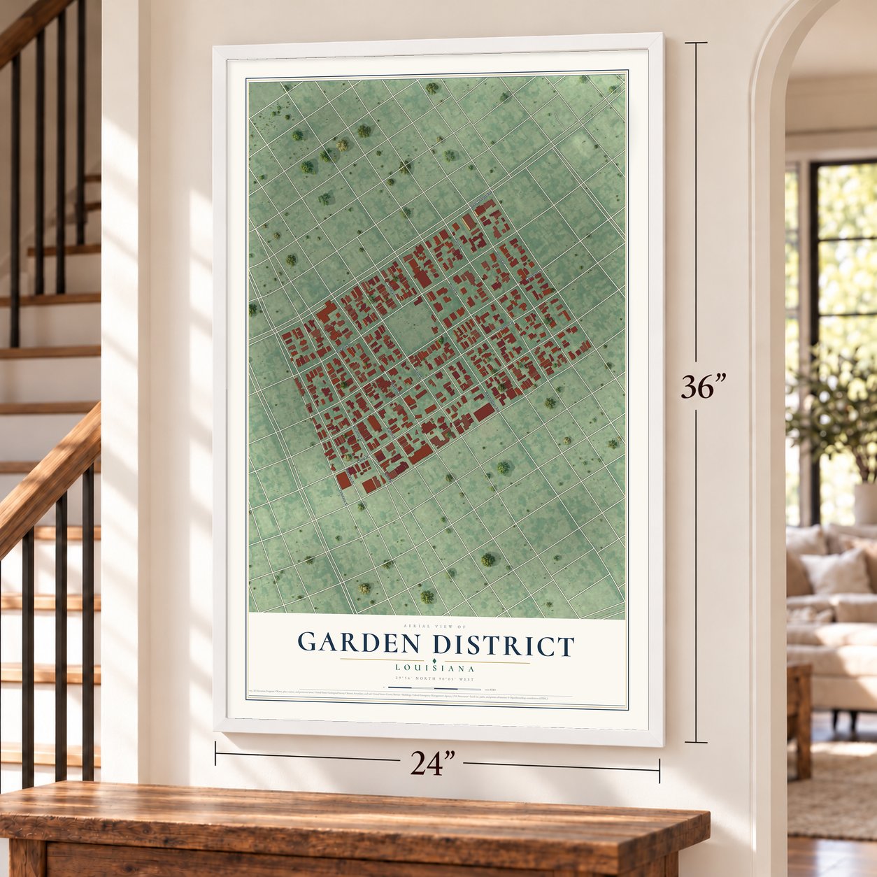 Garden District, Louisiana map, 24 x 36 inch print in a white frame by a staircase
