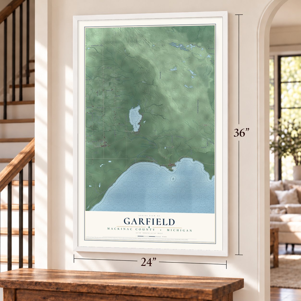 Garfield, Mackinac County, Michigan map, 24 x 36 inch print in a white frame by a staircase