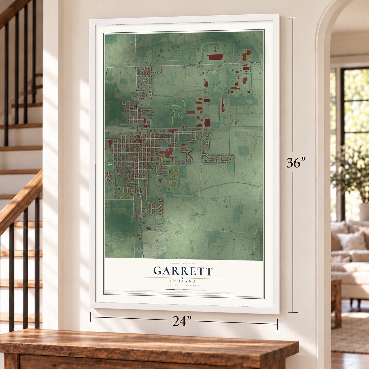 Garrett, Indiana map, 24 x 36 inch print in a white frame by a staircase