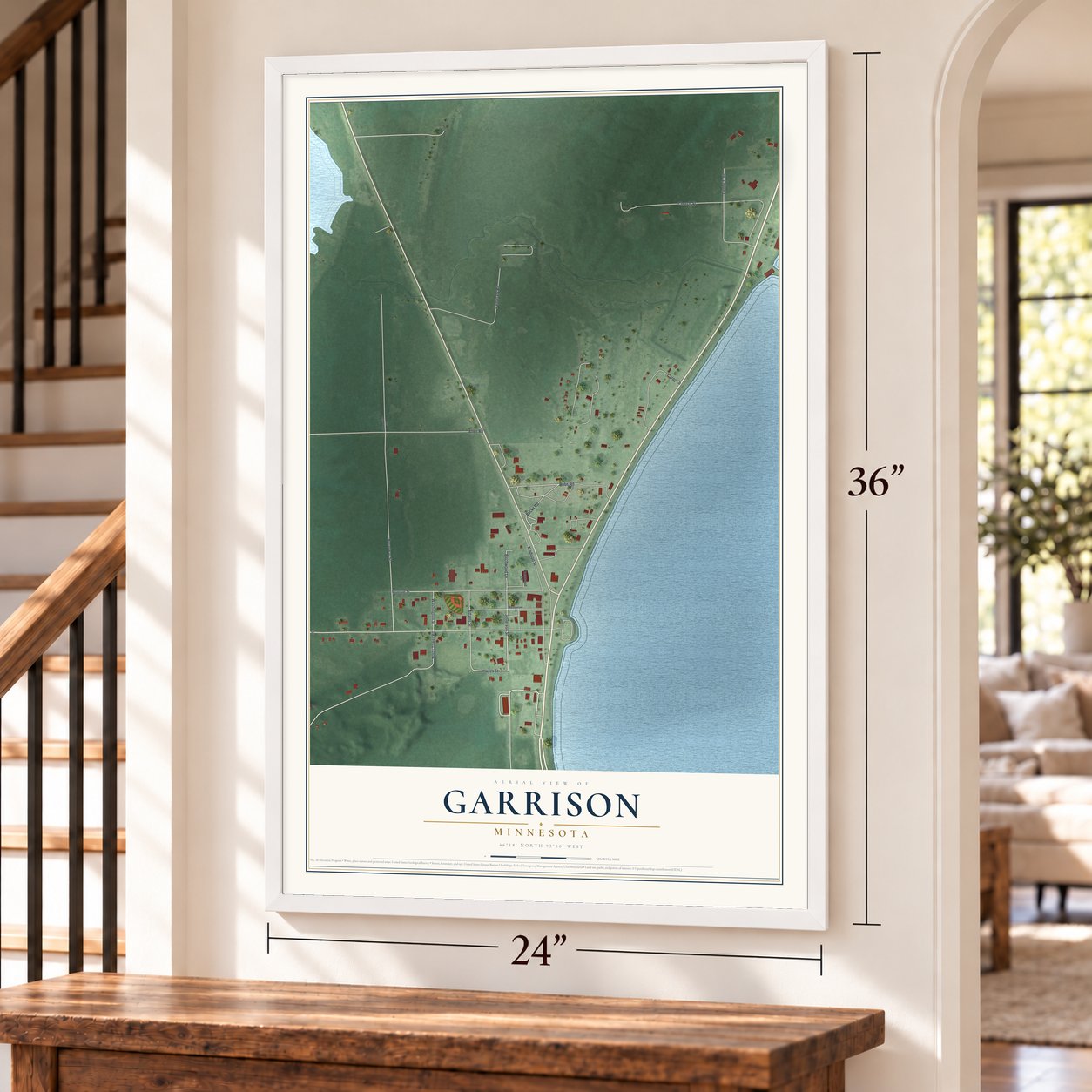 Garrison, Minnesota map, 24 x 36 inch print in a white frame by a staircase