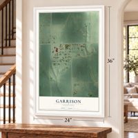 Garrison, Nebraska map, 24 x 36 inch print in a white frame by a staircase