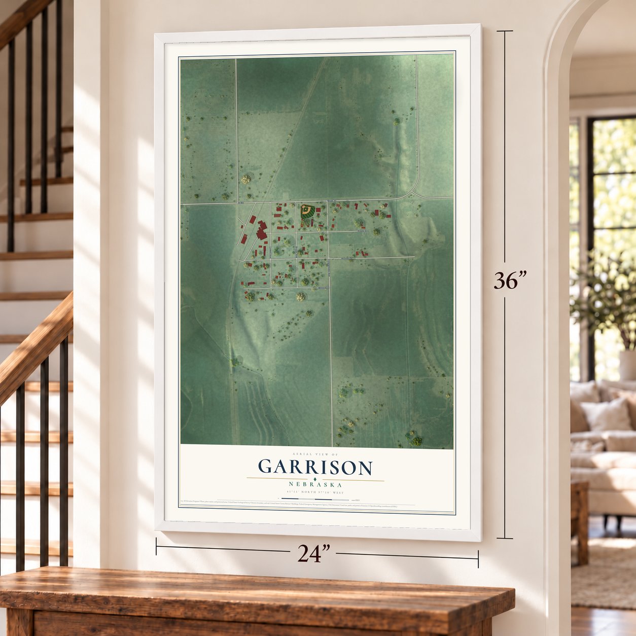 Garrison, Nebraska map, 24 x 36 inch print in a white frame by a staircase