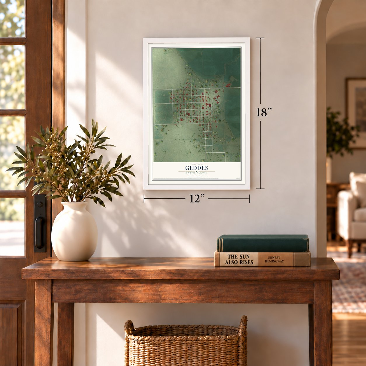 Geddes, South Dakota map, 12 x 18 inch print in a white frame in an entryway