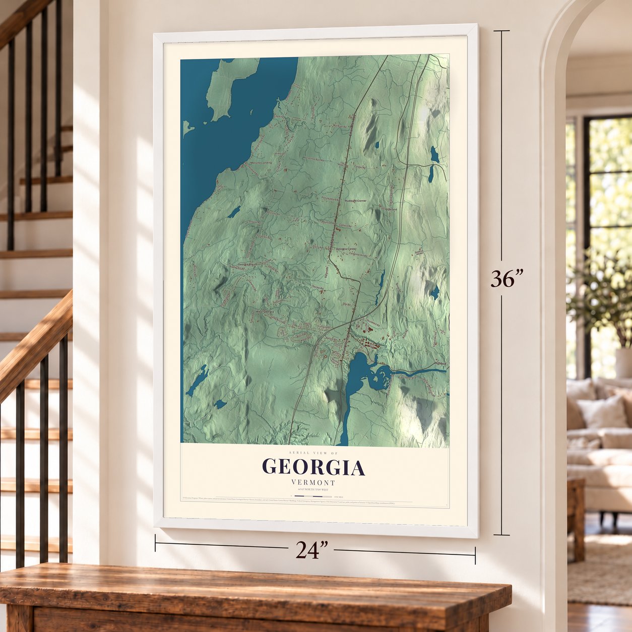 Georgia, Vermont map, 24 x 36 inch print in a white frame by a staircase