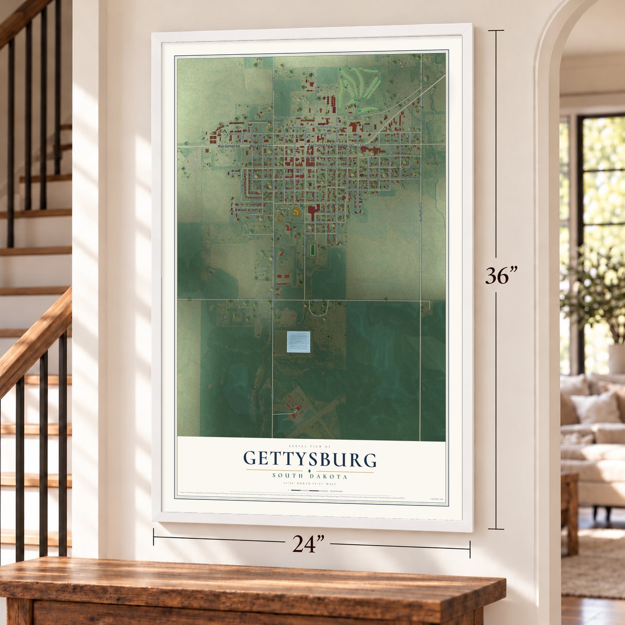 Gettysburg, South Dakota map, 24 x 36 inch print in a white frame by a staircase