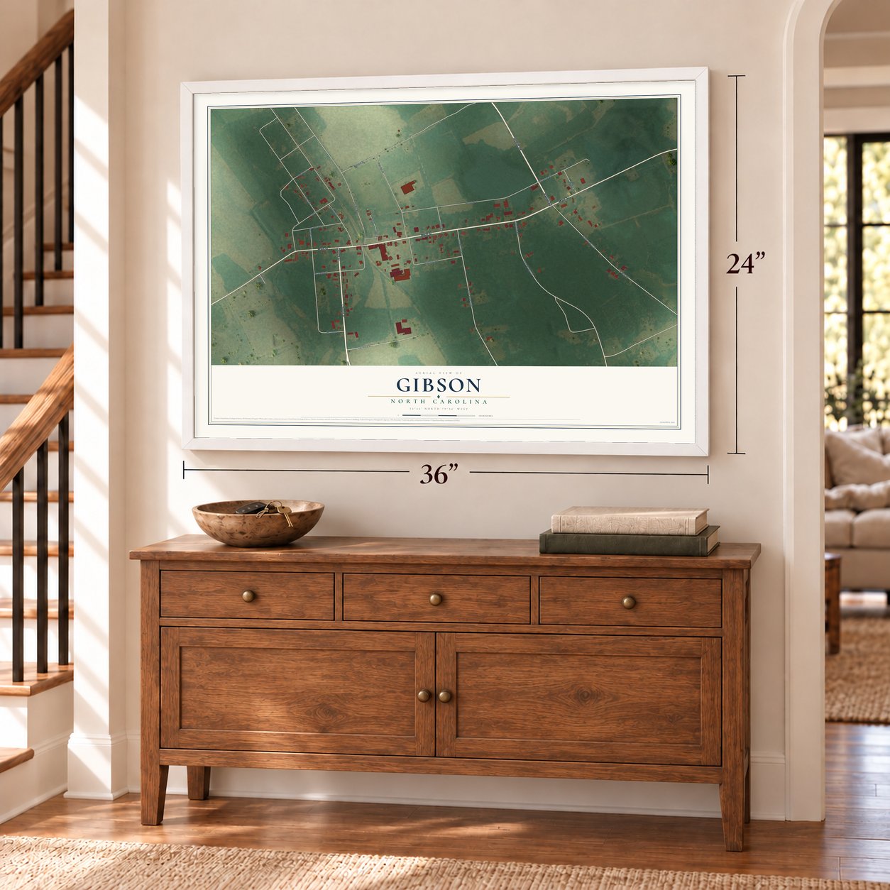Gibson, North Carolina map, 24 x 36 inch print in a white frame above a dresser by a staircase