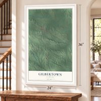 Gilbertown, Alabama map, 24 x 36 inch print in a white frame by a staircase