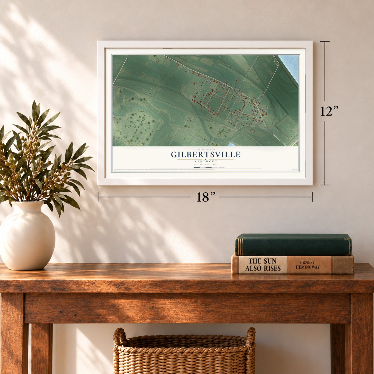 Gilbertsville, Kentucky map, 12 x 18 inch print in a white frame in an entryway