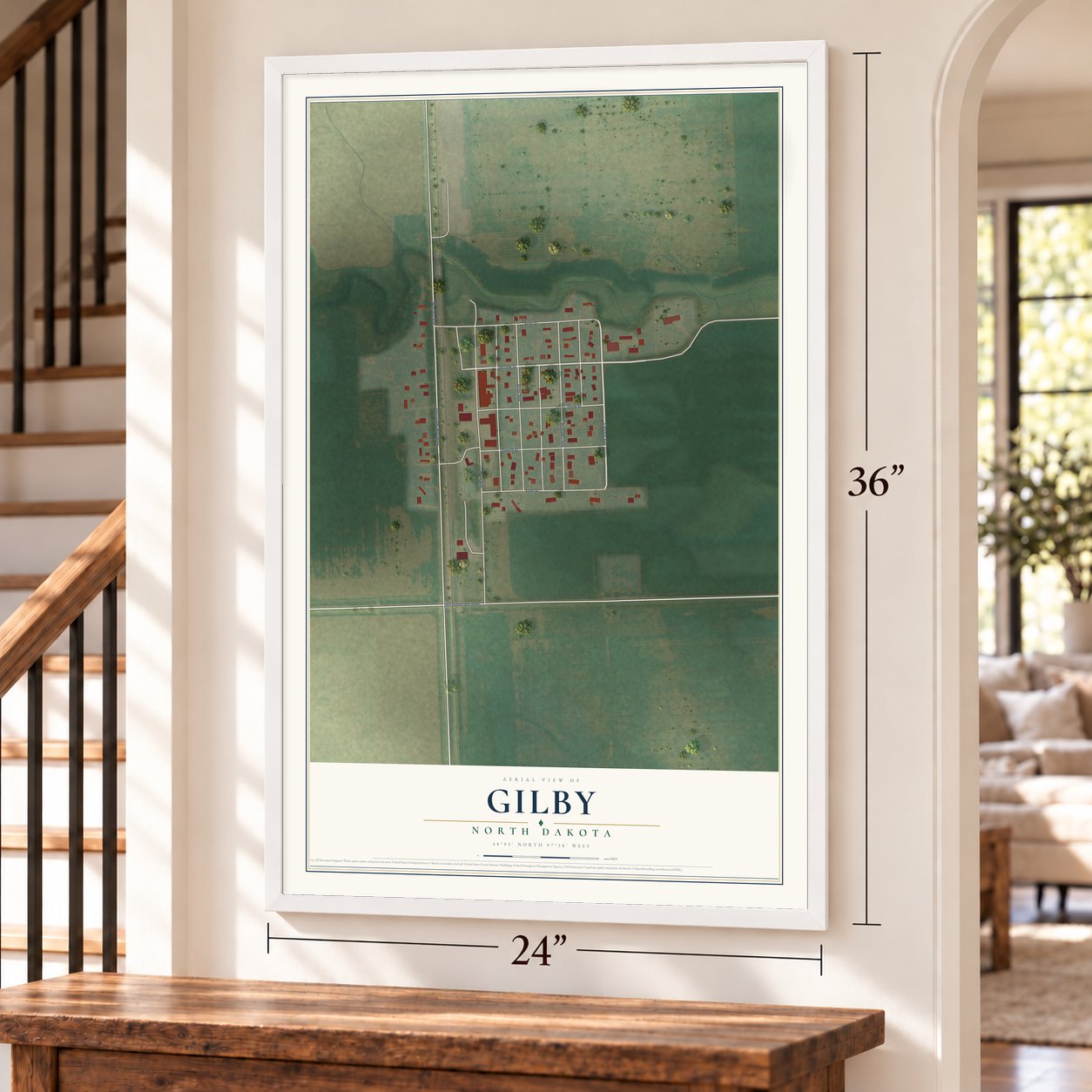 Gilby, North Dakota map, 24 x 36 inch print in a white frame by a staircase