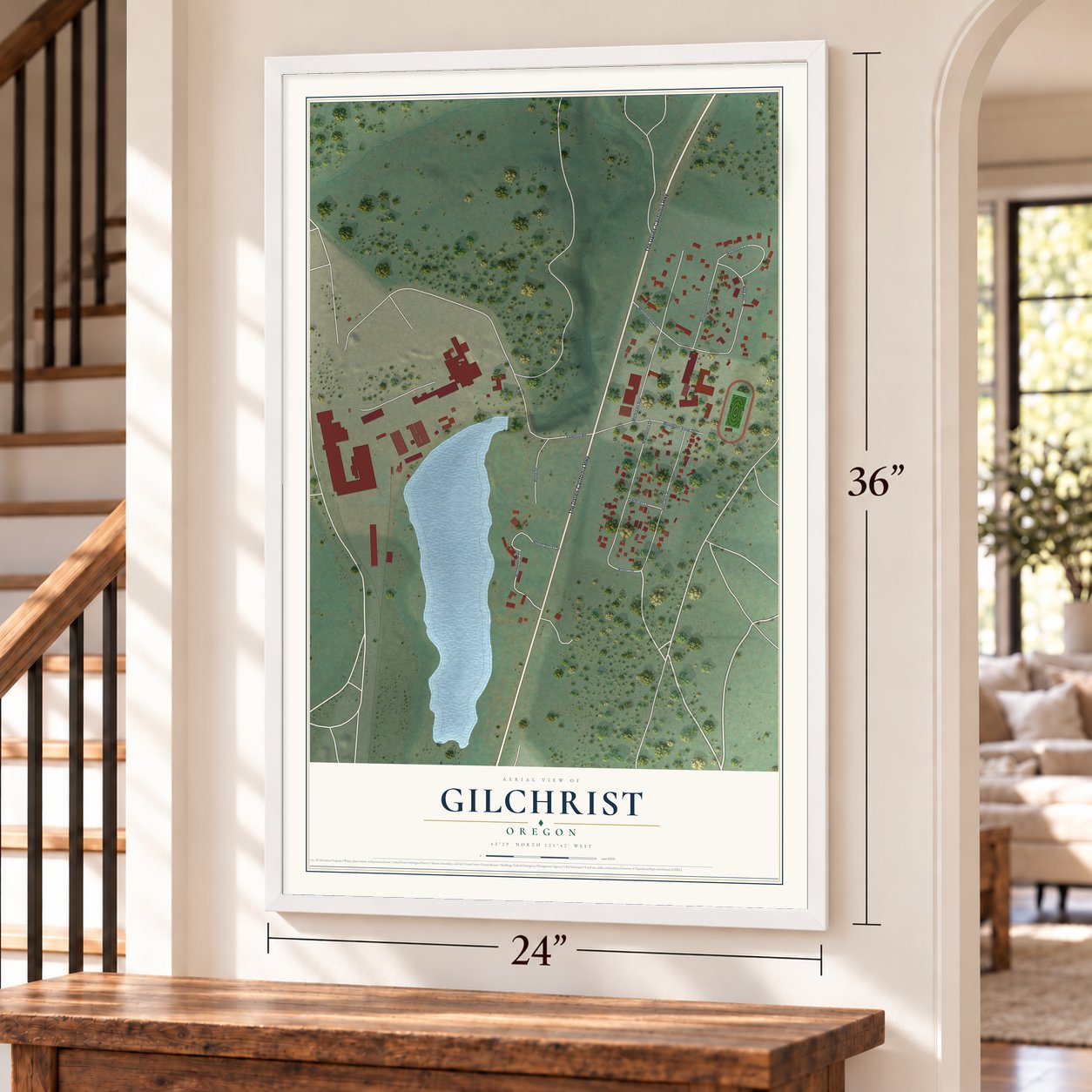 Gilchrist, Oregon map, 24 x 36 inch print in a white frame by a staircase