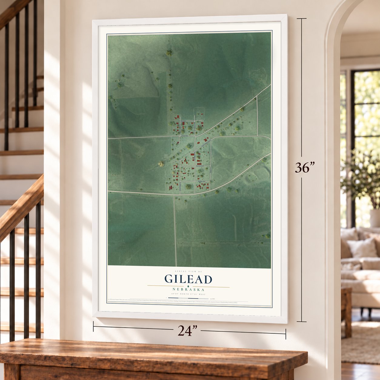 Gilead, Nebraska map, 24 x 36 inch print in a white frame by a staircase