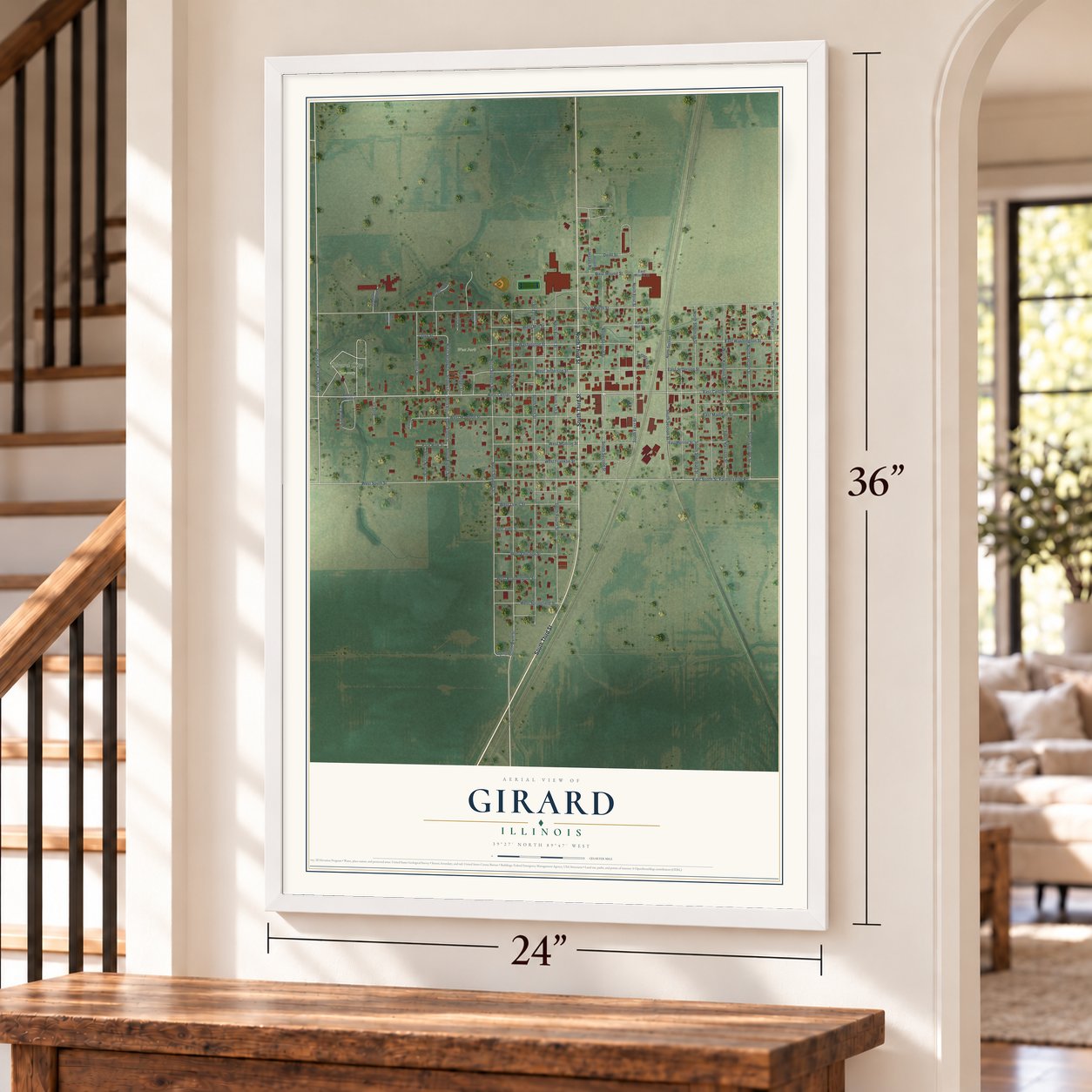 Girard, Illinois map, 24 x 36 inch print in a white frame by a staircase