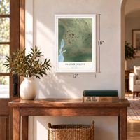 Glacier Colony, Montana map, 12 x 18 inch print in a white frame in an entryway