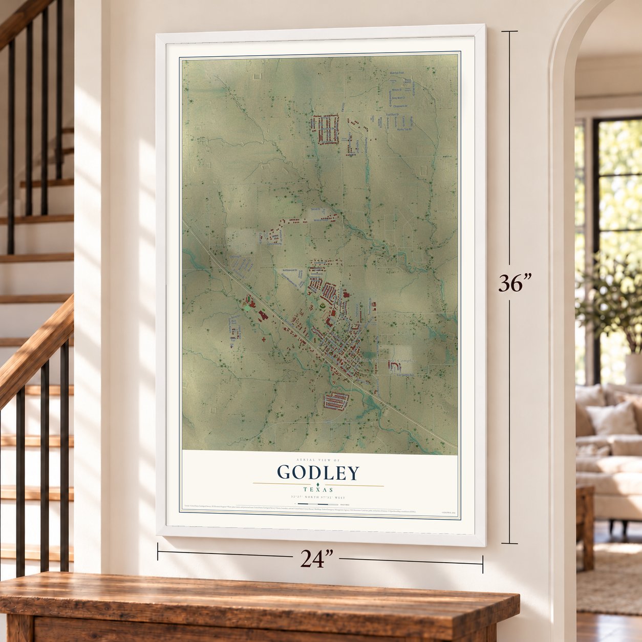 Godley, Texas map, 24 x 36 inch print in a white frame by a staircase