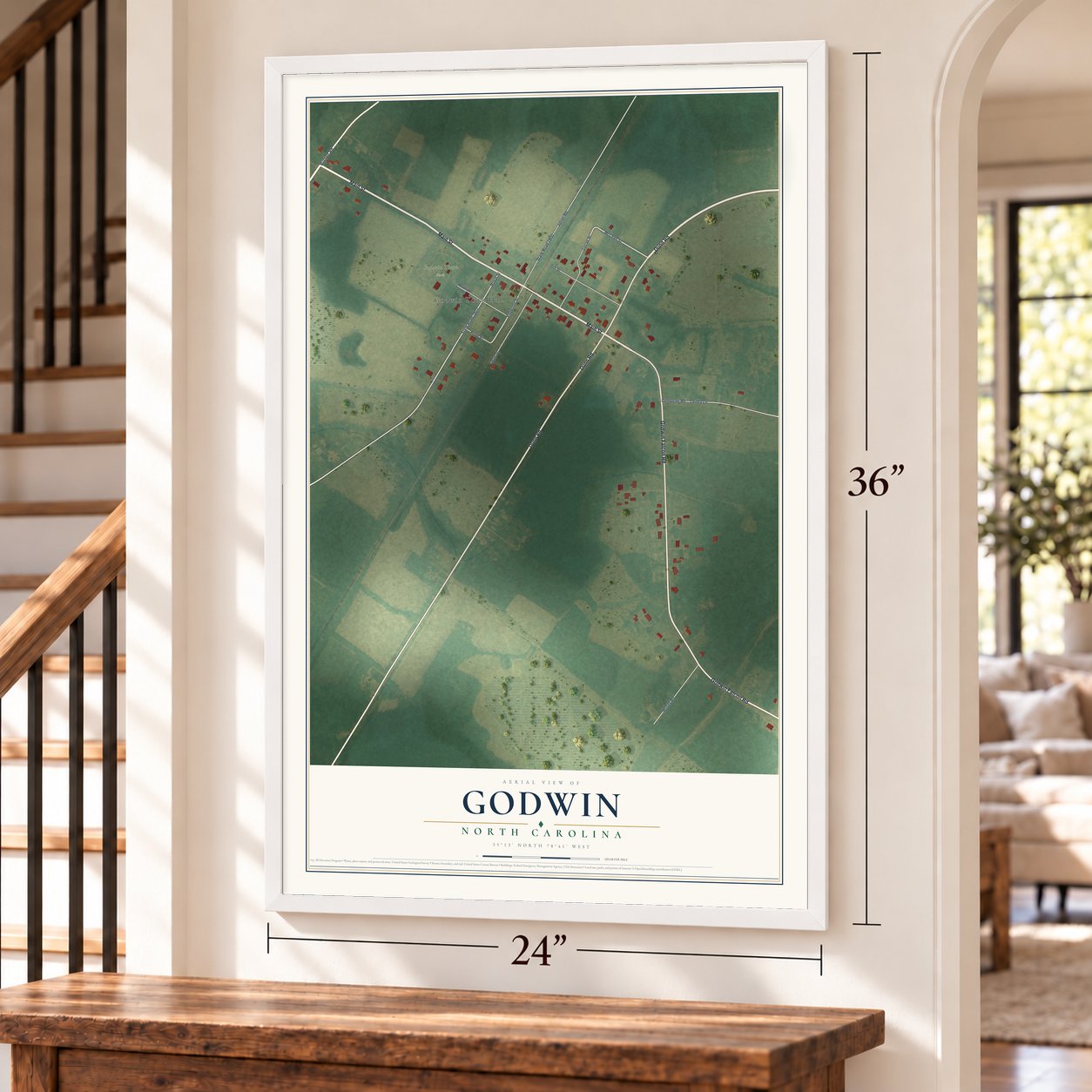 Godwin, North Carolina map, 24 x 36 inch print in a white frame by a staircase