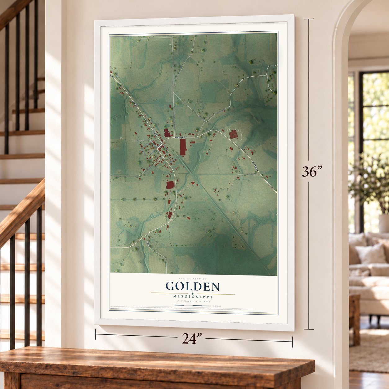 Golden, Mississippi map, 24 x 36 inch print in a white frame by a staircase