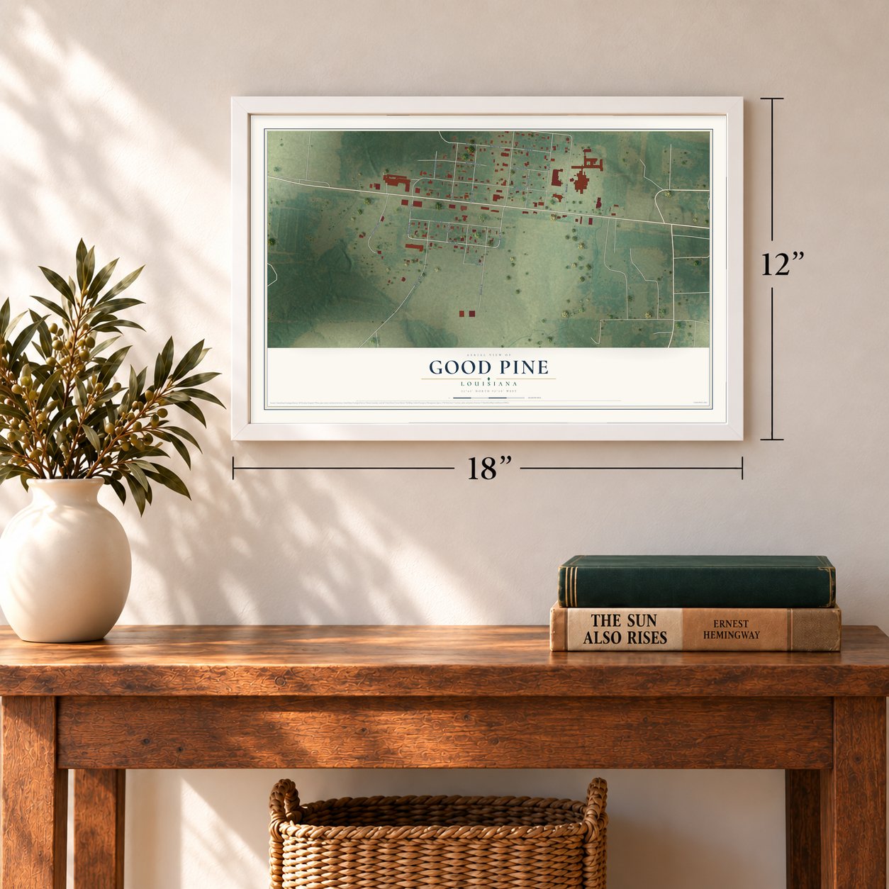 Good Pine, Louisiana map, 12 x 18 inch print in a white frame in an entryway