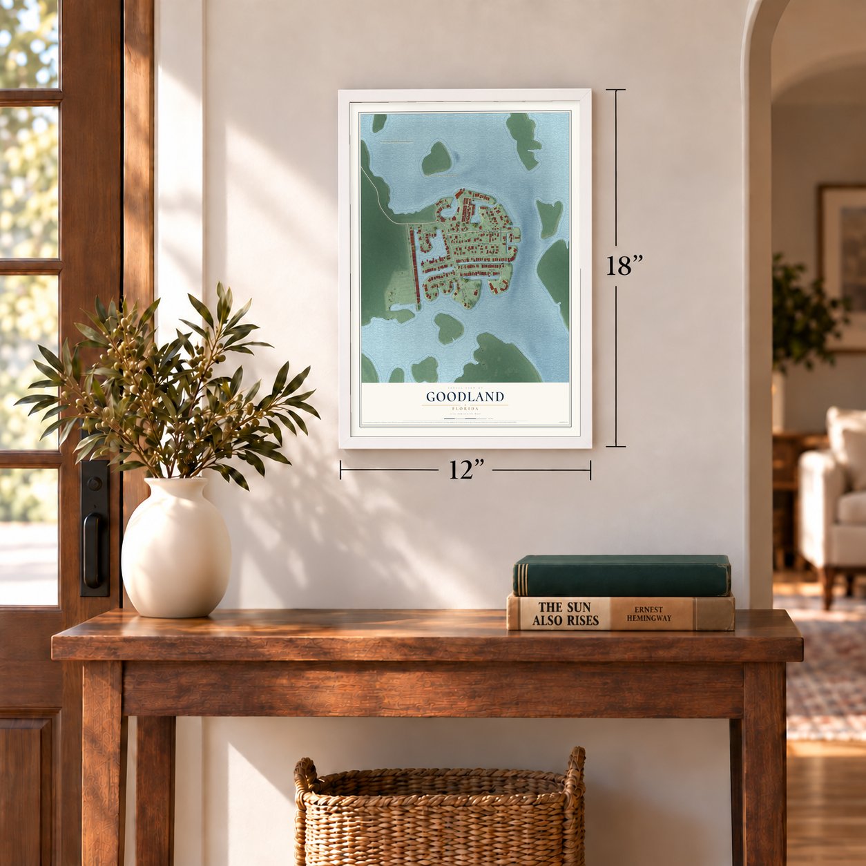 Goodland, Florida map, 12 x 18 inch print in a white frame in an entryway