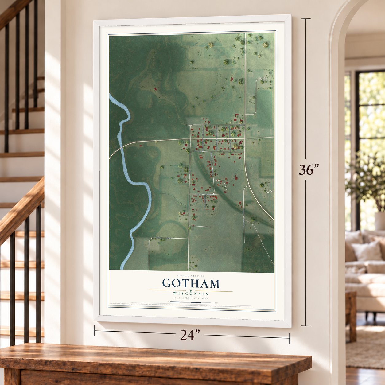 Gotham, Wisconsin map, 24 x 36 inch print in a white frame by a staircase
