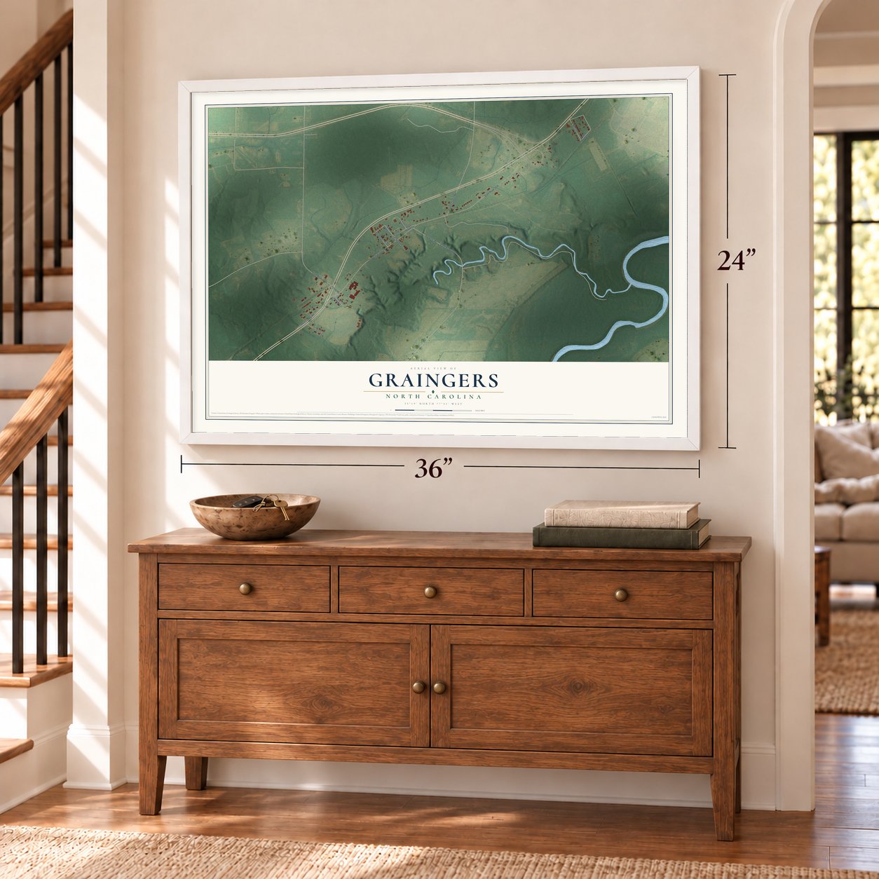 Graingers, North Carolina map, 24 x 36 inch print in a white frame above a dresser by a staircase
