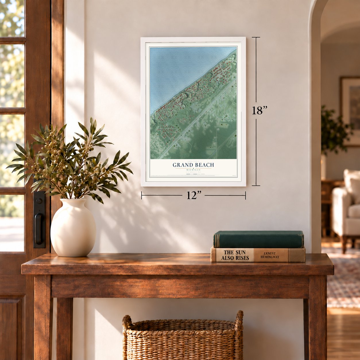 Grand Beach, Michigan map, 12 x 18 inch print in a white frame in an entryway