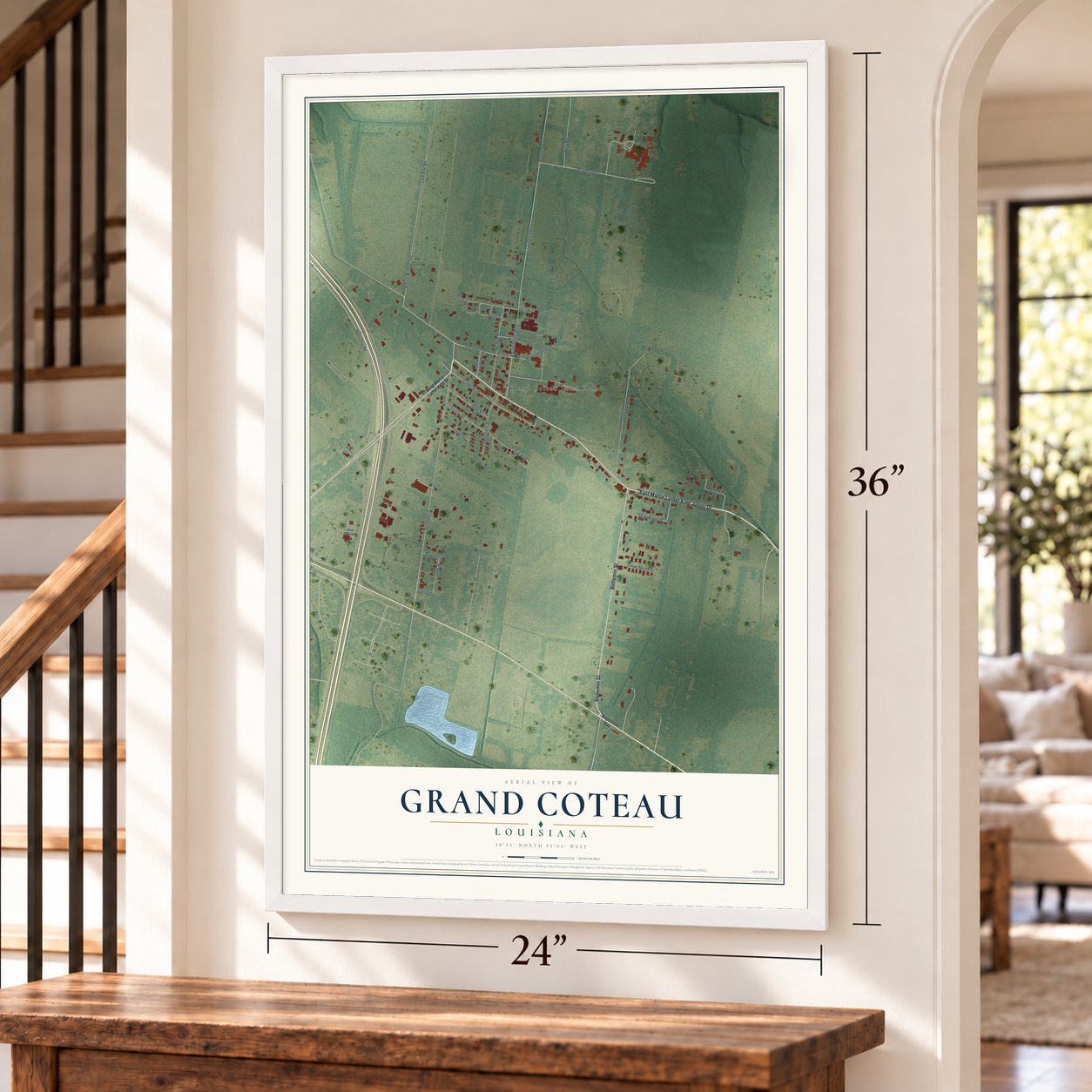 Grand Coteau, Louisiana map, 24 x 36 inch print in a white frame by a staircase