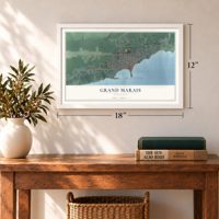 Grand Marais, Minnesota map, 12 x 18 inch print in a white frame in an entryway